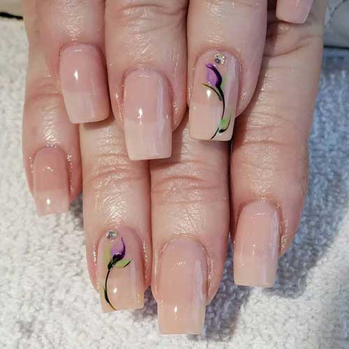 nude nail color and floral art